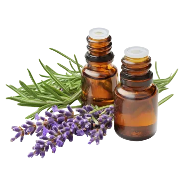 a bottle of lavender essential oil next to some lavender flowers