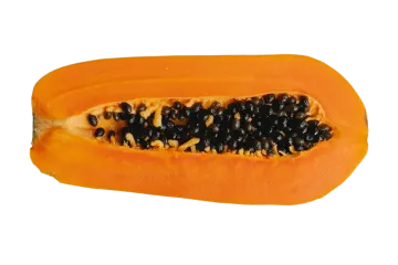 A half of a papa with seeds on it