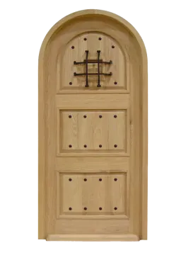 a wooden door with a cross on the top