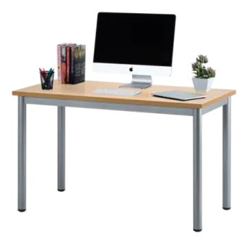 a computer desk sitting on top of a wooden table