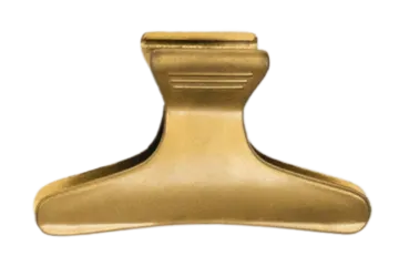 a brass plate with a small hole in the middle
