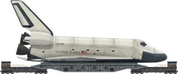 the space shuttle is sitting on top of a train