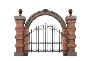 an iron gate with a brick wall