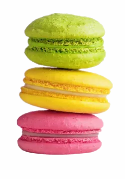 a stack of colorful macaros on a white background