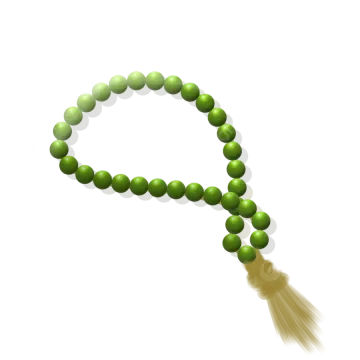a green bea necklace with a ta
