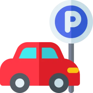 a red car next to a parking sign