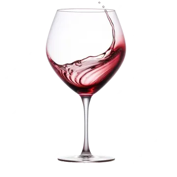 a wine glass filled with red wine