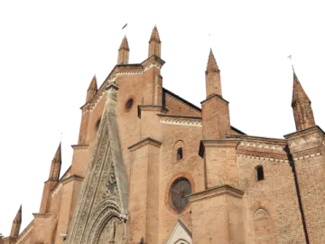 a tall building with a clock on the front