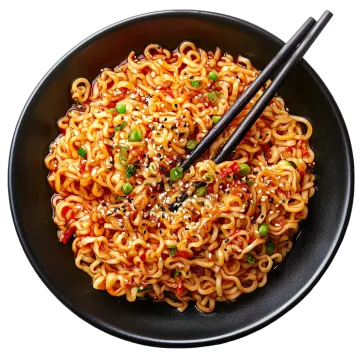 a bowl of noodles with chops in it