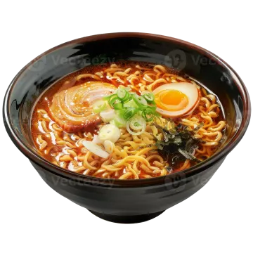 a bowl of noodles with an egg on top