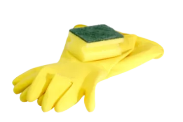 a pair of yellow gloves with a green sponge on top