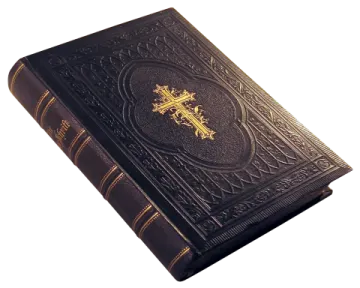 an old book with a cross on it