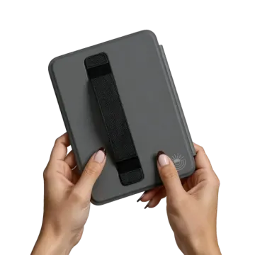 a woman's hands holding an ipad case
