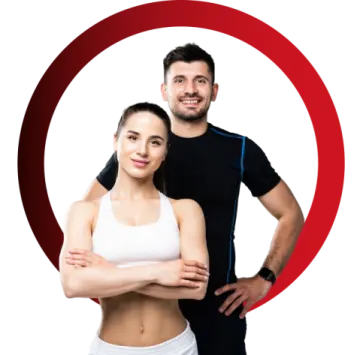 a man and woman standing in front of a red circle