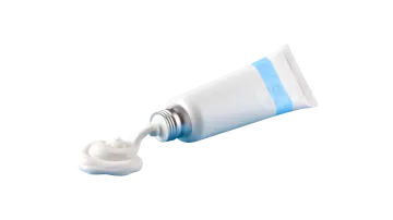 a white tube with a blue cap on it
