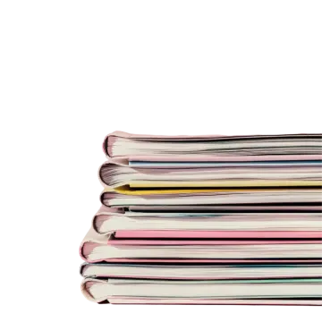 a stack of magazines on a white background