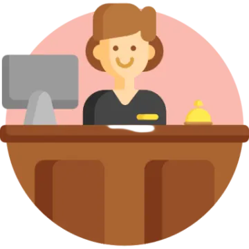 a woman sitting at a desk with a computer