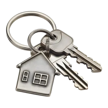 a house shaped keychain on a white background