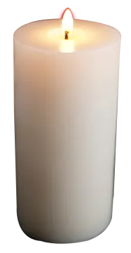 a white candle sitting on top of a table