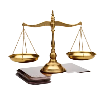 a golden balance scale on a white background