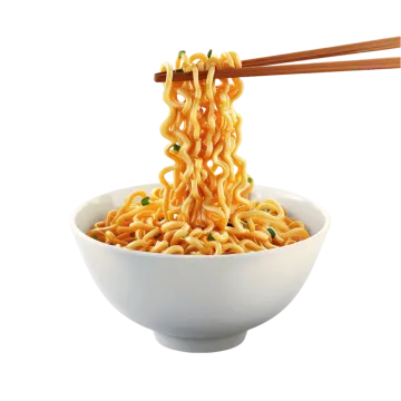 a bowl of noodles with chops in it