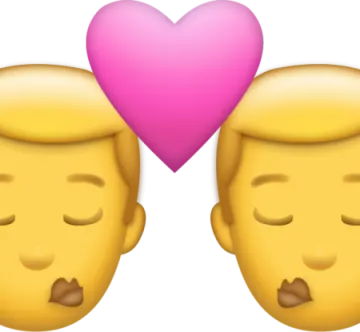 two faces with a heart in the middle
