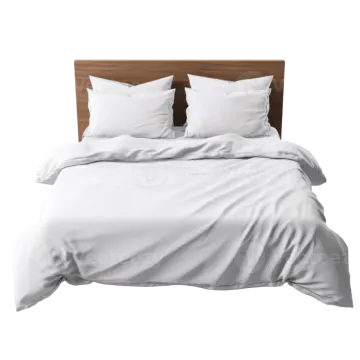 a bed with white sheets and pillows on it