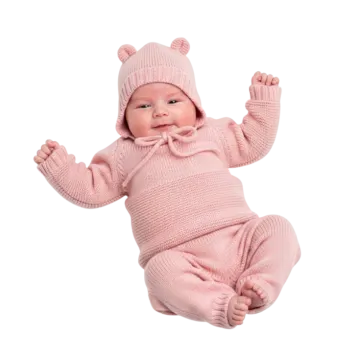 a baby in a pink knitted suit and hat