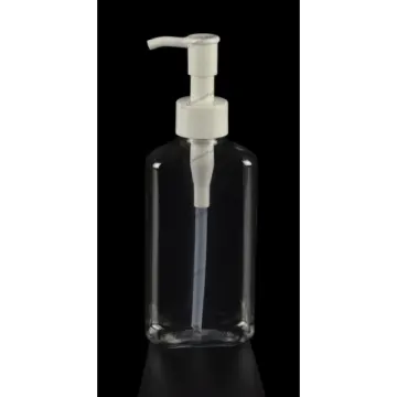 a clear bottle with a white pump on it