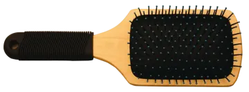 a wooden brush with blue dots on it