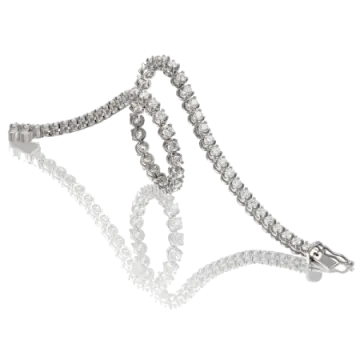 a diamond and white gold bracelet