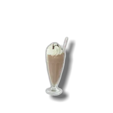 a glass filled with chocolate and whipped cream