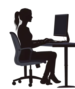 a silhouette of a woman sitting at a computer