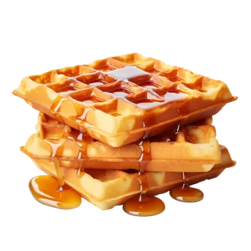 a stack of was with syrup on top