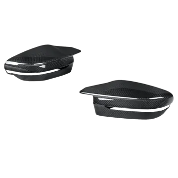 a pair of black carbon fiber seat covers