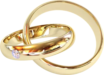 two gold wedding rings with a diamond