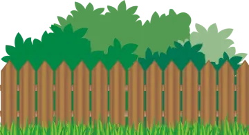 a wooden fence with grass and trees