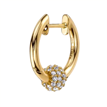 a pair of yellow gold hoop earrings with diamonds
