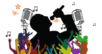 a crowd of people with their hands up in the air