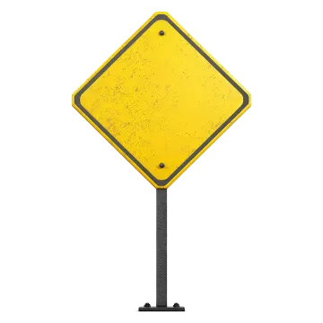 a yellow road sign on a black pole