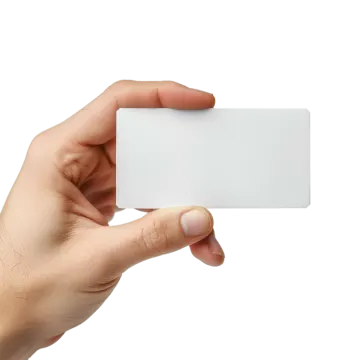 a hand holding a white business card