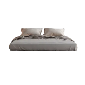 a bed with grey sheets and pillows on it