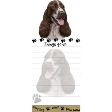 a brown and white dog with paws on it's back