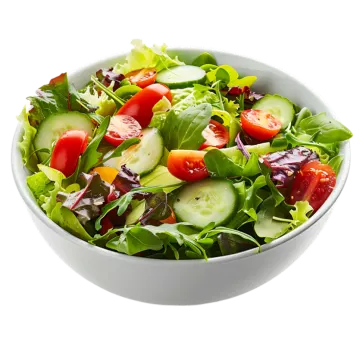a white bowl filled with a green salad