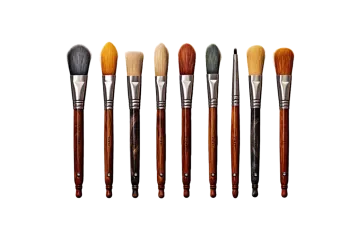 a set of brushes with wooden handles