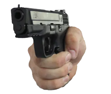 a person holding a handgun in their hand