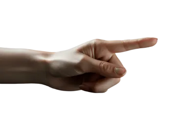 a person's hand pointing at something