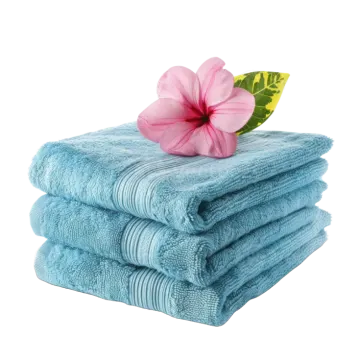 a stack of towels with a pink flower on top