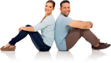 a man and woman sitting on the floor