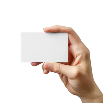 a hand holding a business card on a white background
